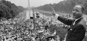 martin luther king speaking at a rally