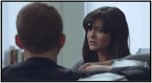 a man and a woman sitting next to each other