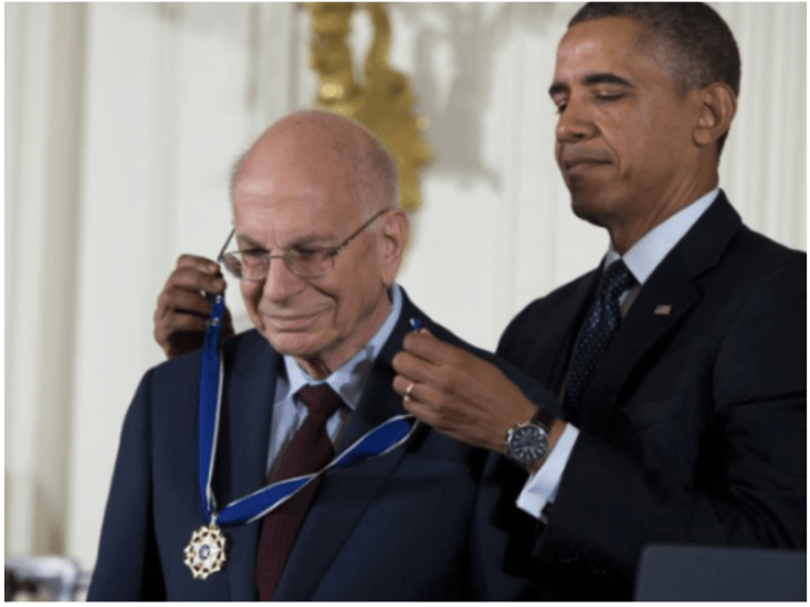 the president is getting his medal pinned